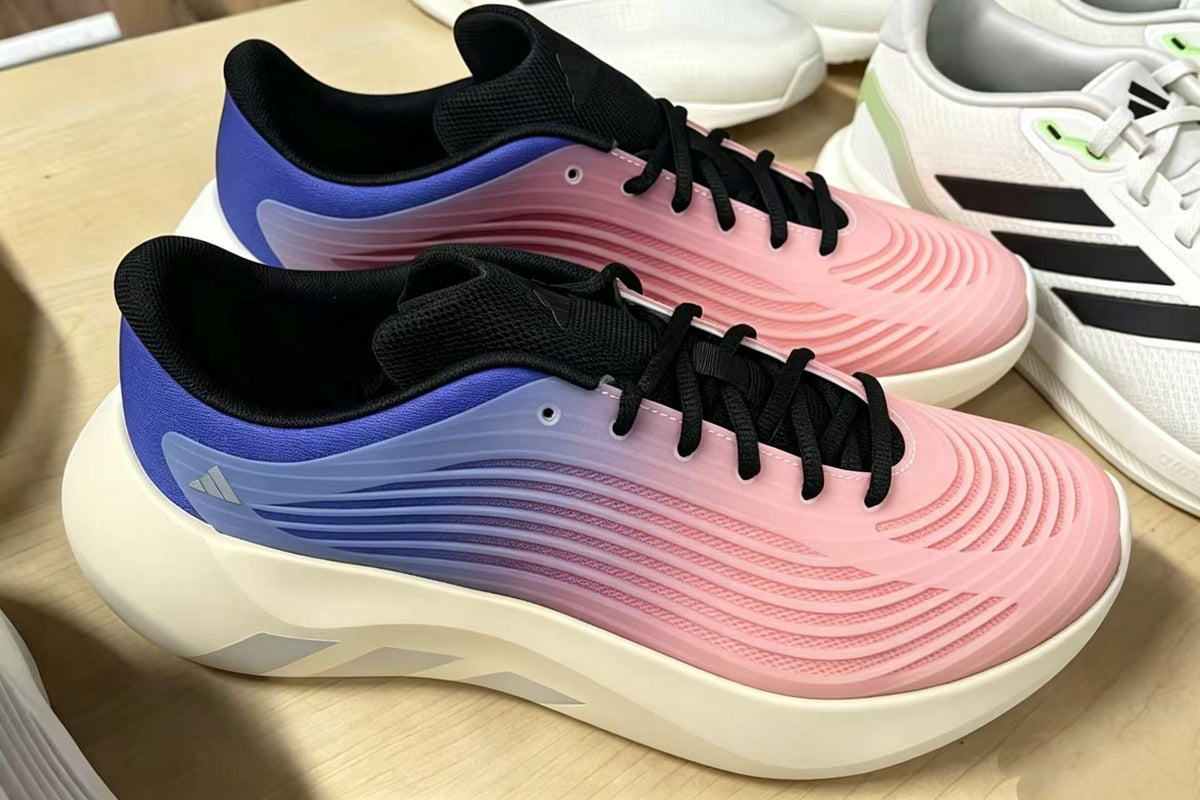 Pink and Blue Sneakers for Running with Black Laces - product image from the listing.