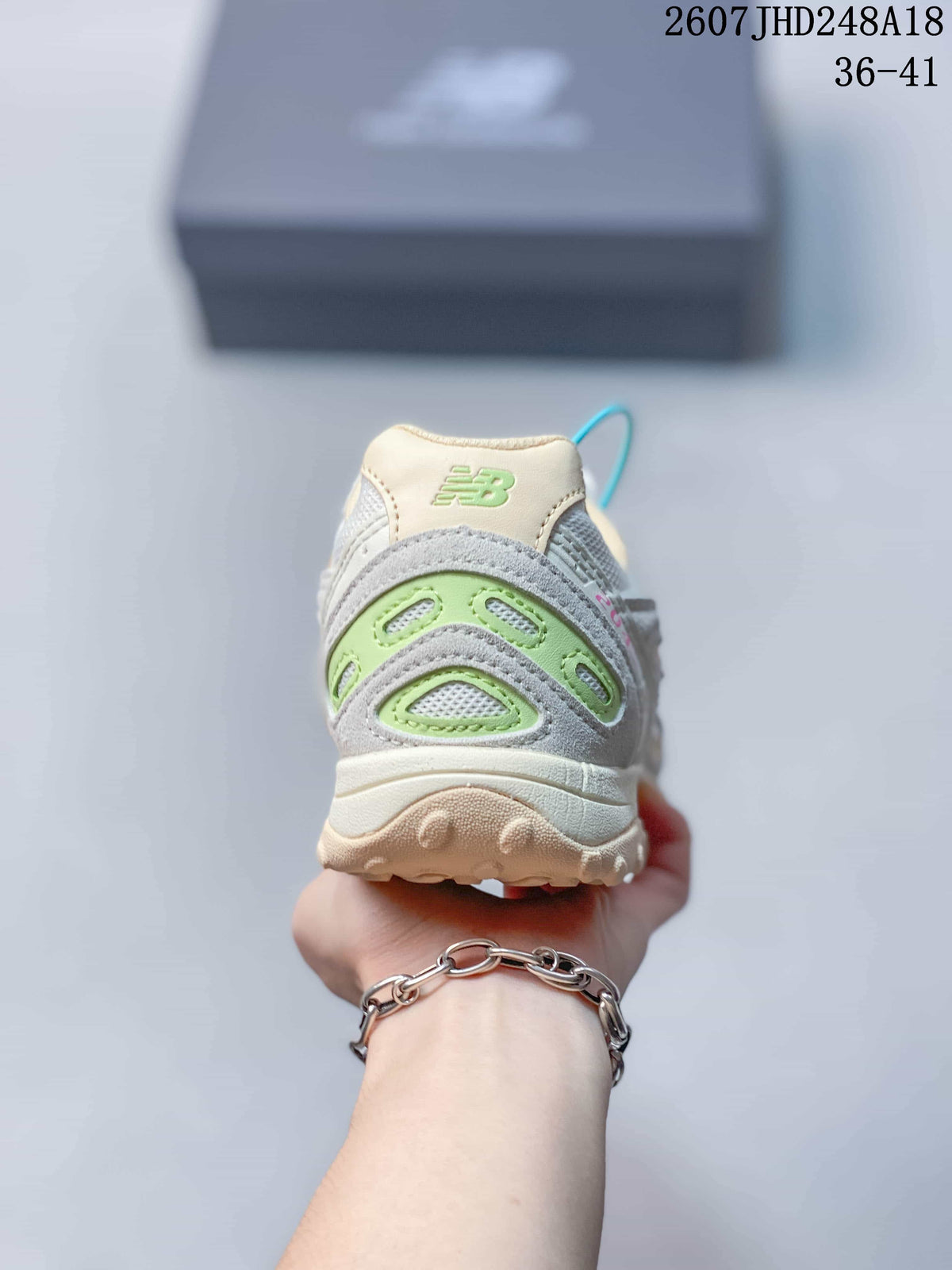 Cream and Gray New Balance 204L Low-Top Sneakers - product image from the listing.