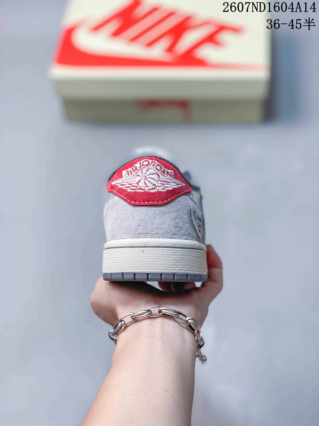 Nike SB Dunk Low Sneakers in Gray and Off-White 2607ND1604A14 - product image from the listing.