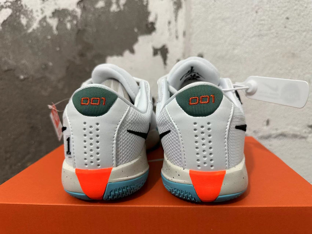 Nike G.T. Cut Academy Basketball Shoes, in White and Green - product image from the listing.