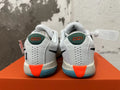 Nike G.T. Cut Academy Basketball Shoes, in White and Green - product image from the listing.