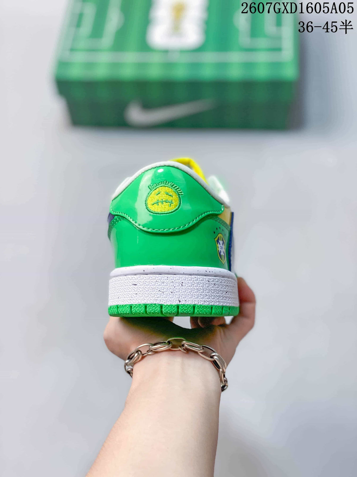 Air Jordan 1 Low Green Yellow Blue Sneakers - product image from the listing.