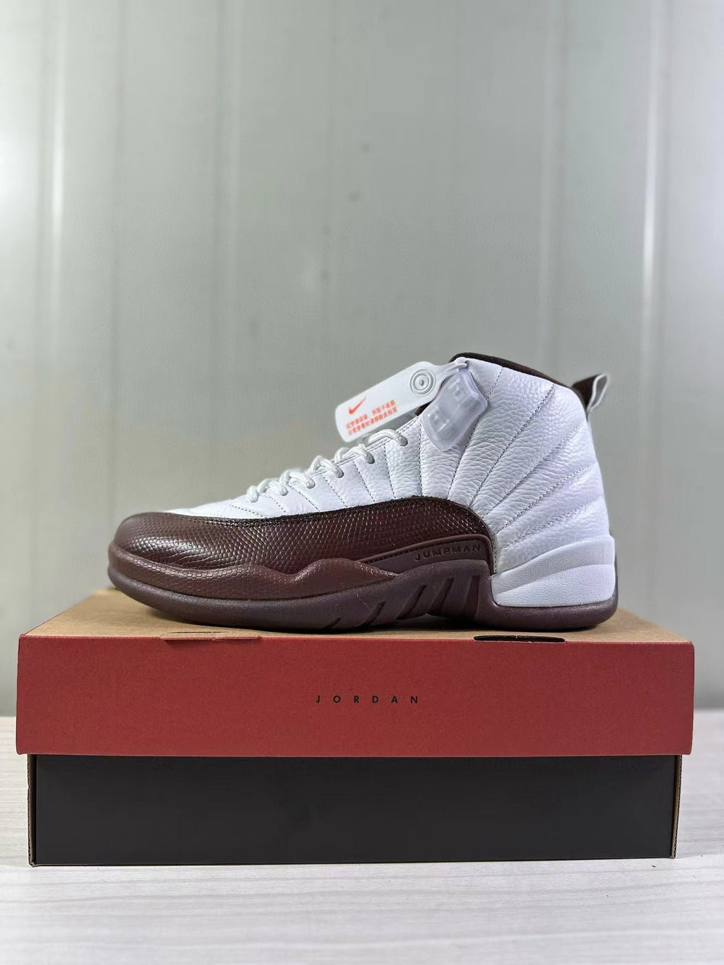 Air Jordan 12 Retro White Brown FZ5026-100 Sneakers - product image from the listing.