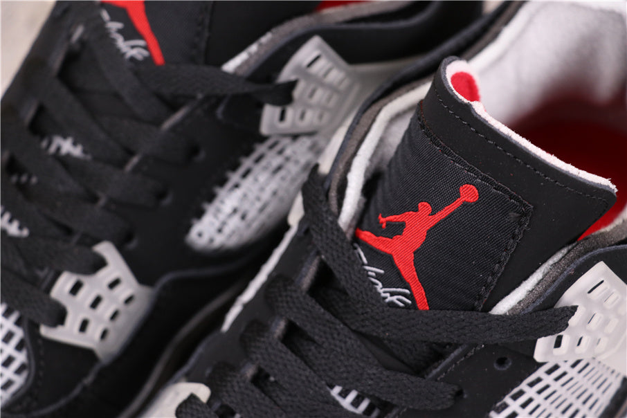 Air Jordan 4 Sneakers in Black Grey Red AQ9129-412 - product image from the listing.