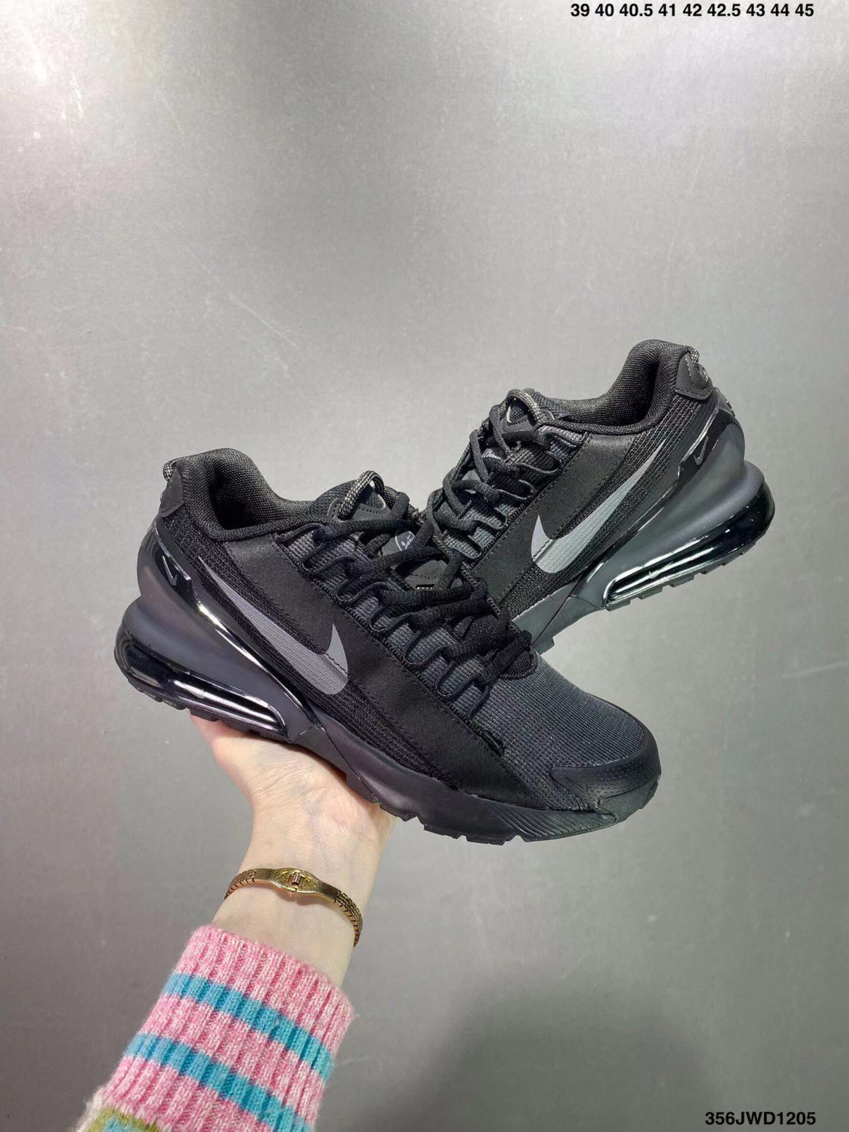 Black and Gray Nike Air Max Pulse Sneakers - product image from the listing.