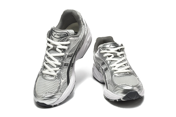 ASICS GEL-Kayano 14 Running Sneakers in Silver - product image from the listing.