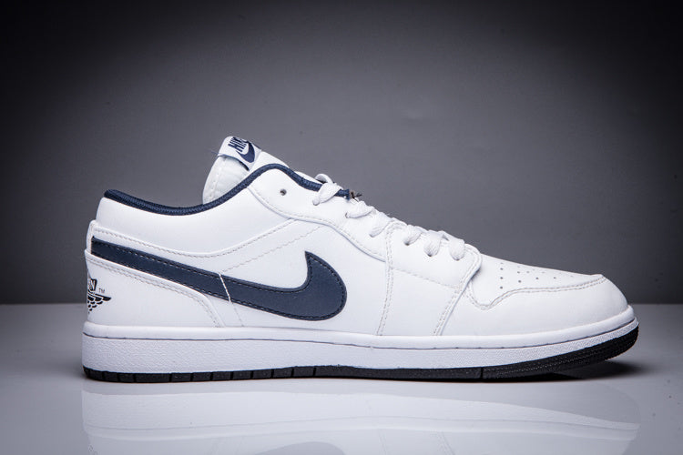 Air Jordan 1 Low White and Black Sneakers - product image from the listing.