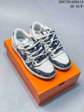Nike SB Dunk Low Low-Top Sneakers in White and Navy - product image from the listing.