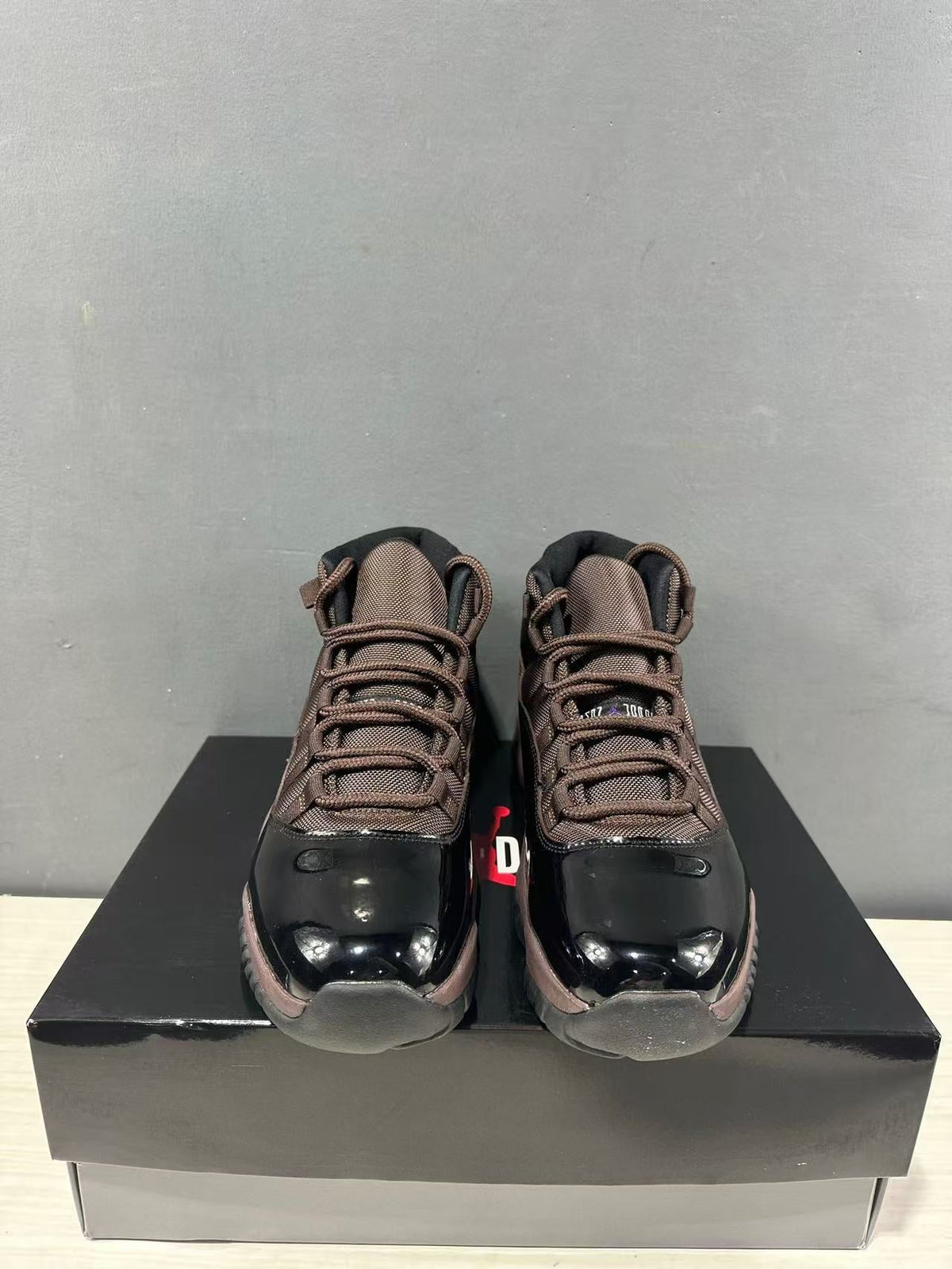 Air Jordan 11 Retro Black Bronze High-Top Sneakers - product image from the listing.