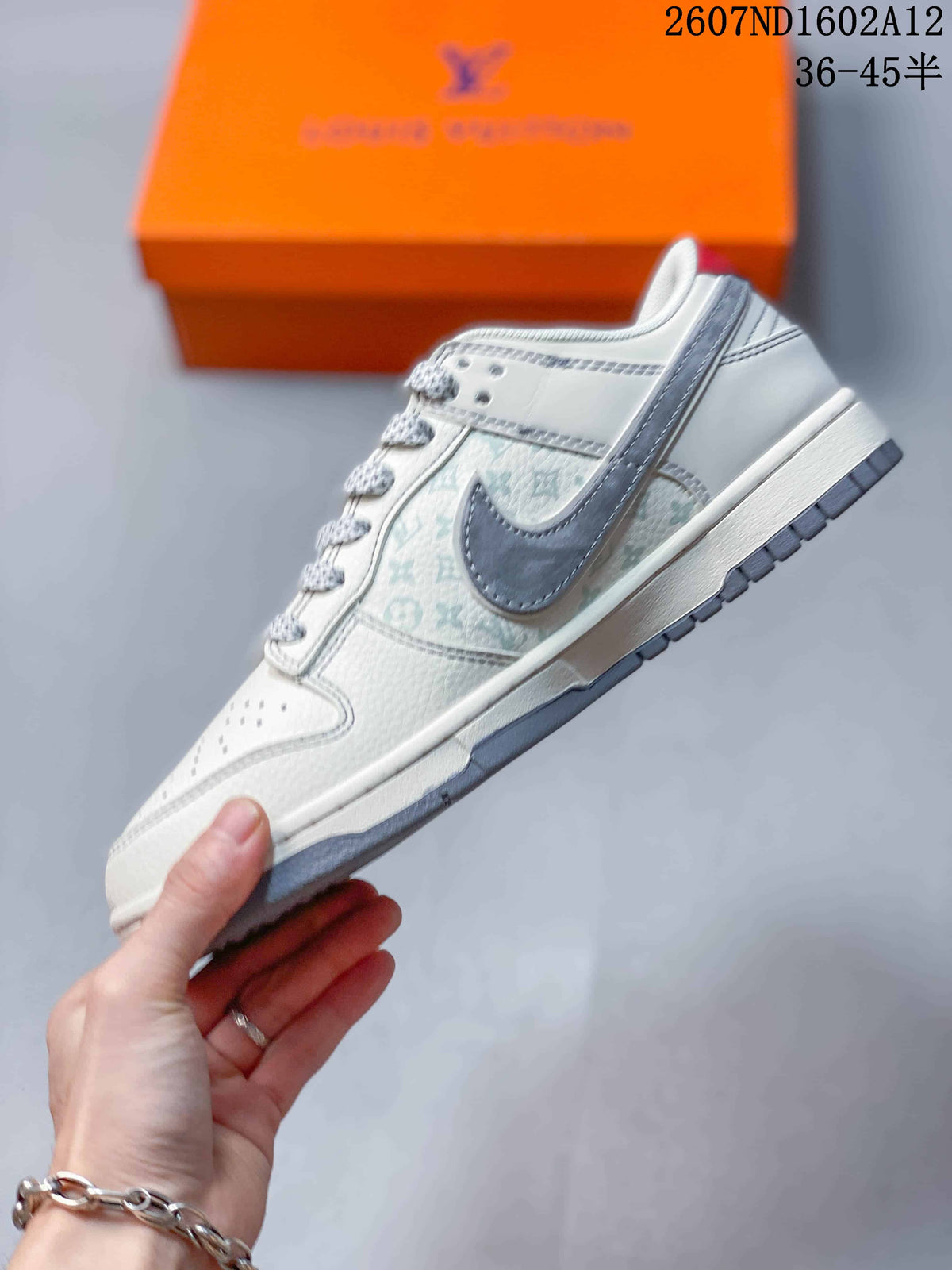Nike SB Dunk Low Sneakers in White Gray Red 2607ND1602A12 - product image from the listing.