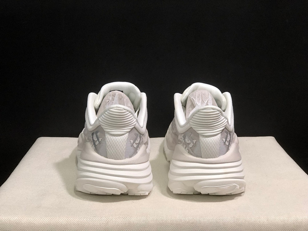 HOKA Stinson 7 Sneakers in White and Gray - product image from the listing.