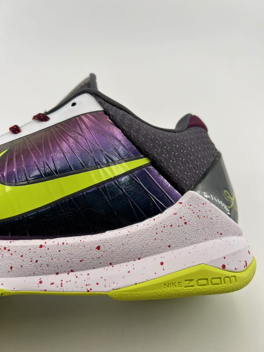 Nike Kobe 5 Protro Basketball Shoes in White Purple Volt CD4991-100 - product image from the listing.