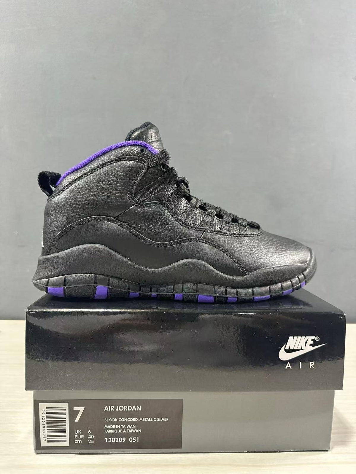 Air Jordan 10 High-Top Sneakers Black Purple 130209-051 - product image from the listing.