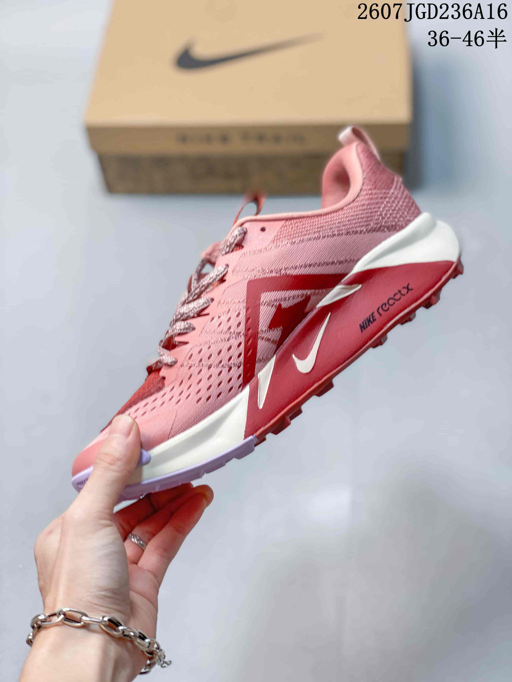 Nike ReactX Wildhorse 10 Trail Shoes in Pink - product image from the listing.