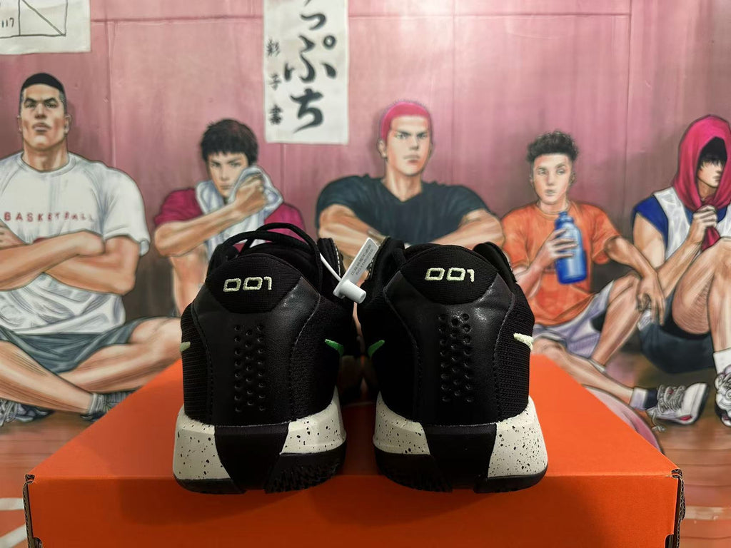 Nike Basketball Shoes in Black and Green - product image from the listing.