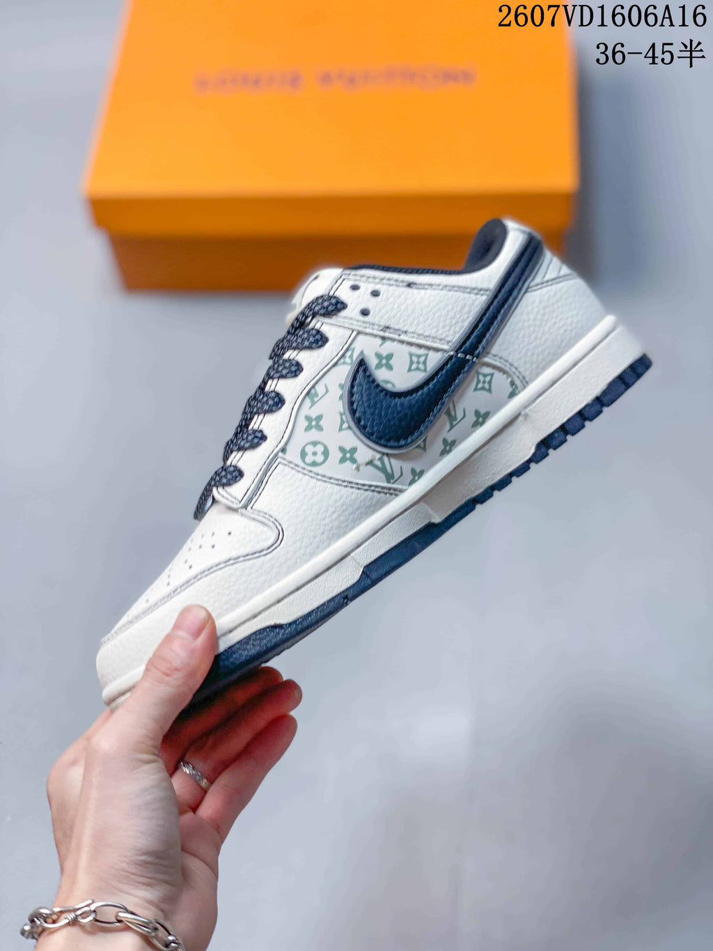 Nike SB Dunk Low LV Monogram Sneakers in White and Navy - product image from the listing.