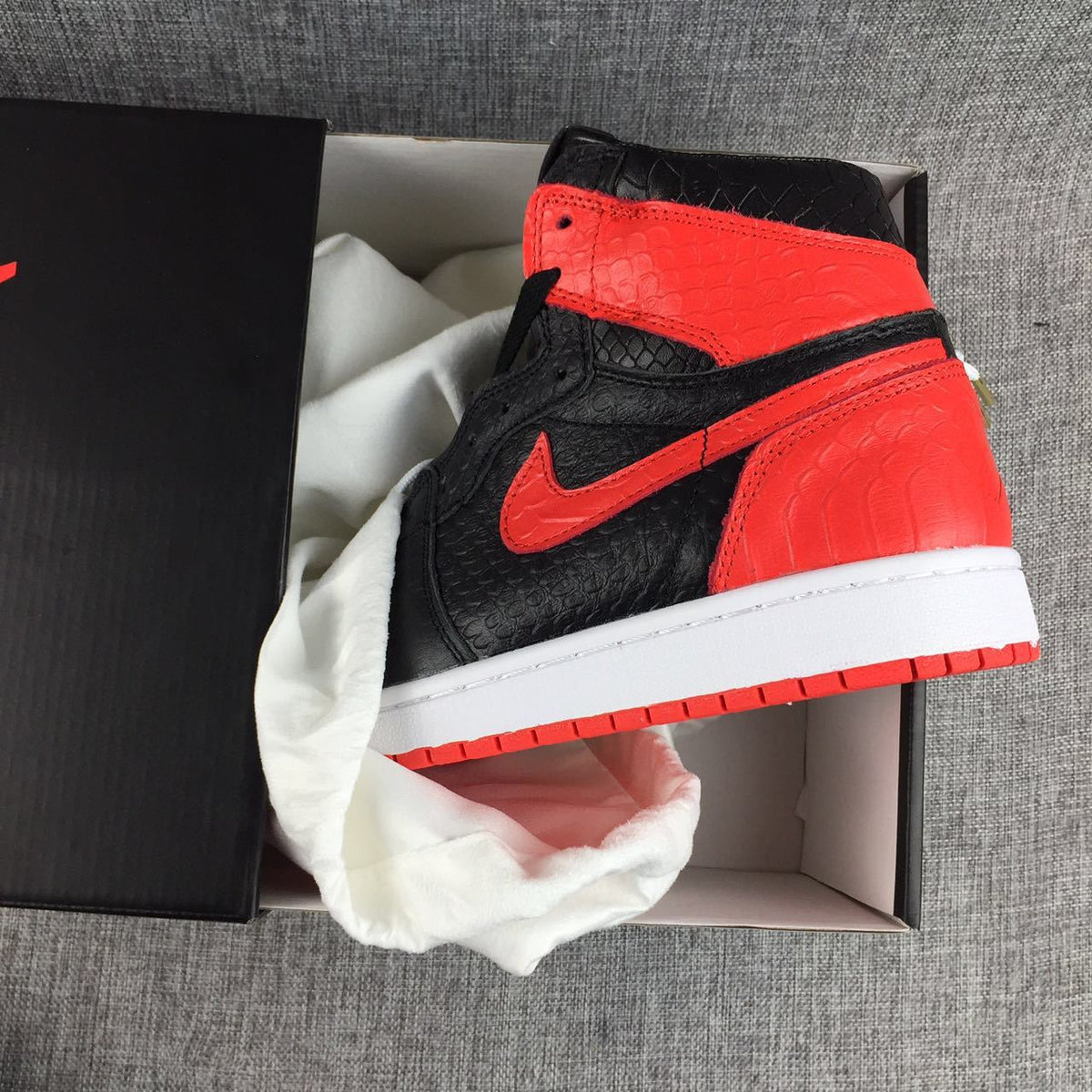 Black Red Scale-Textured Sneakers - Air Jordan 1 High - product image from the listing.