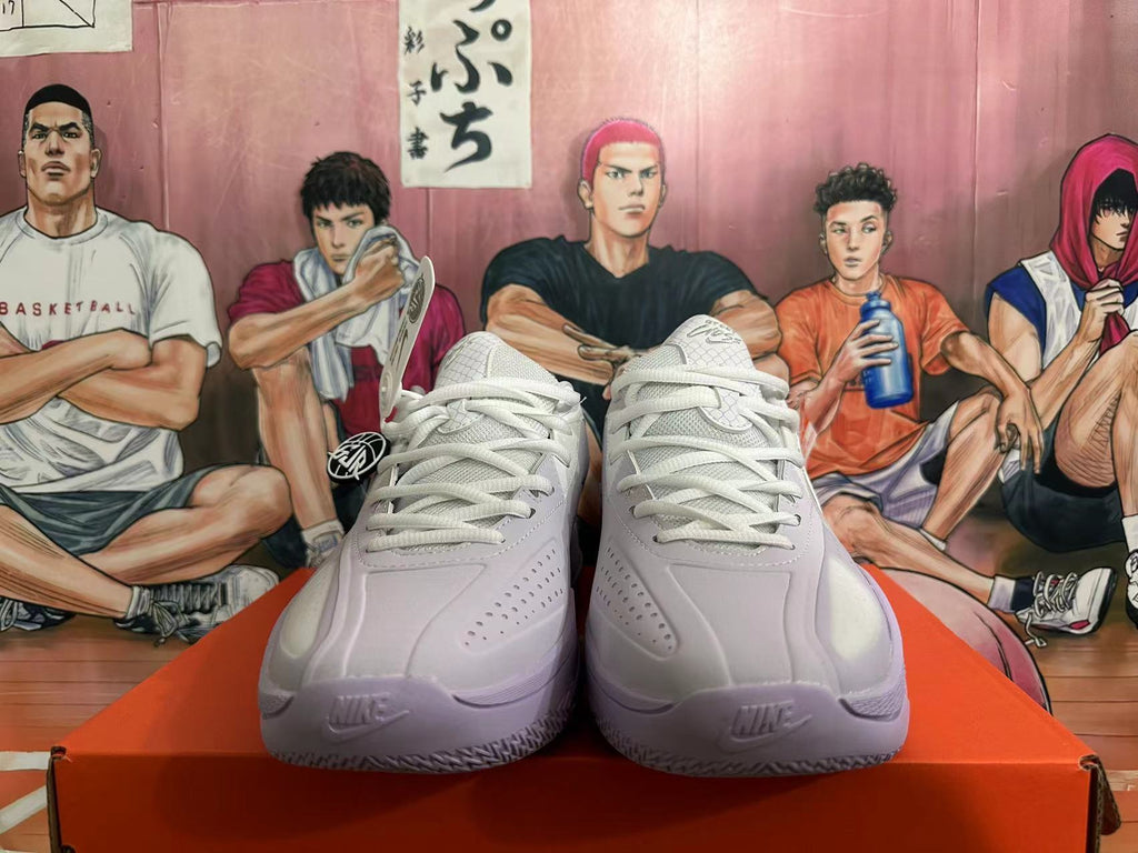 White and Purple Nike Basketball Shoes - product image from the listing.