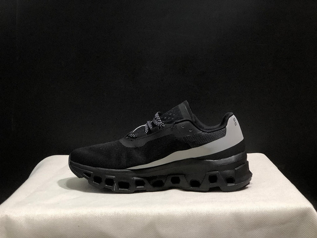 Black and Silver On Cloud X Sneakers - product image from the listing.