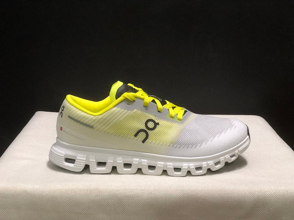 On Cloud 6 Push Sneakers in White and Yellow - product image from the listing.
