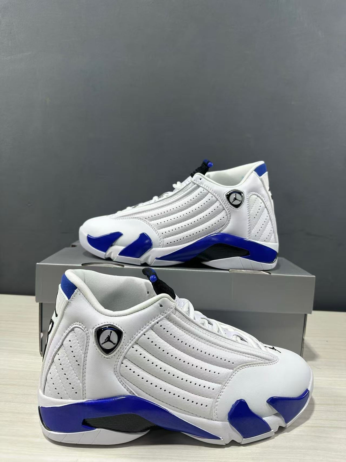 Air Jordan 14 Hyper Royal White Blue 487471-104 - product image from the listing.