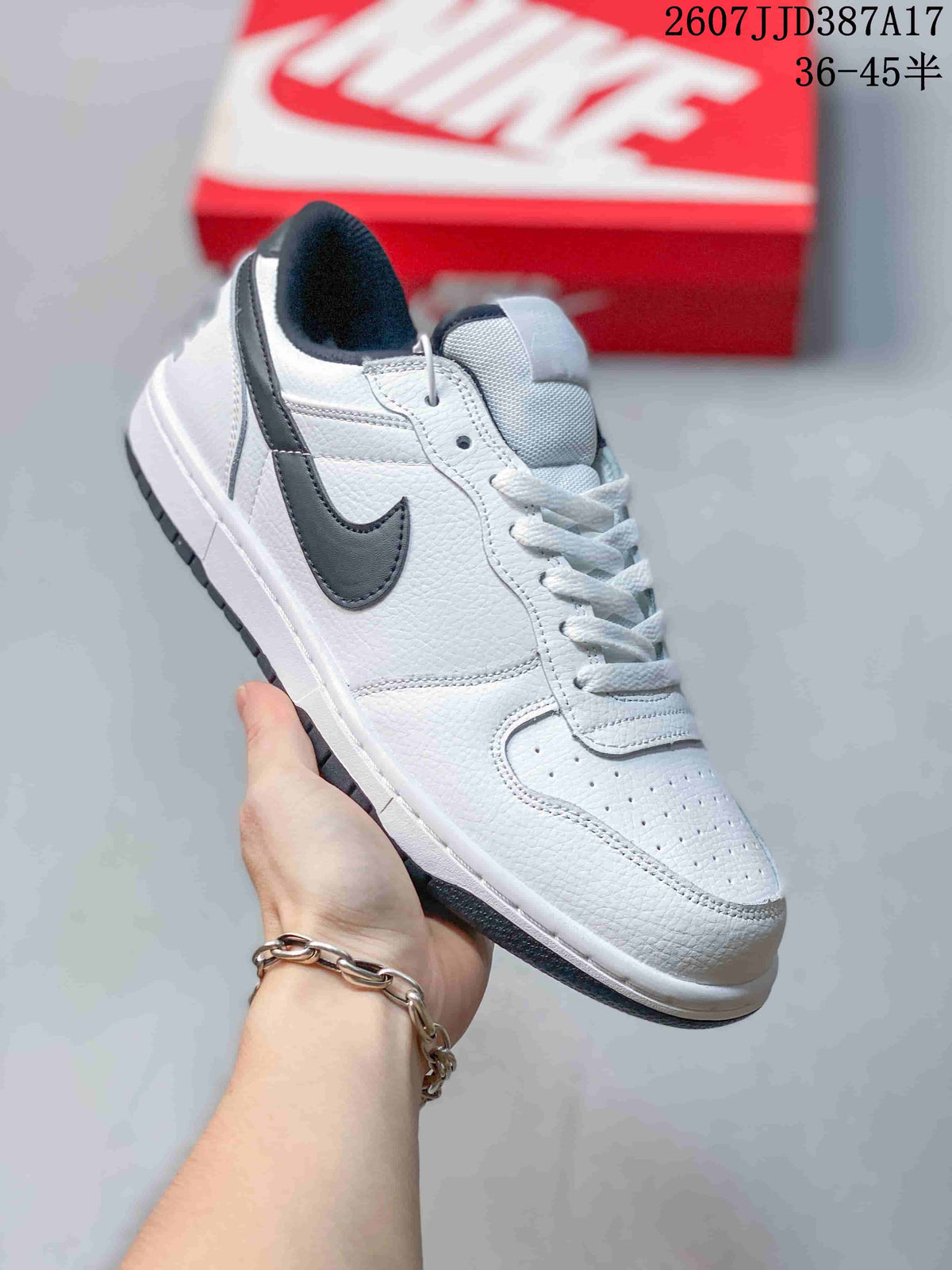 Nike Big Nike Low Sneakers in Black, Green, in White and Navy - product image from the listing.