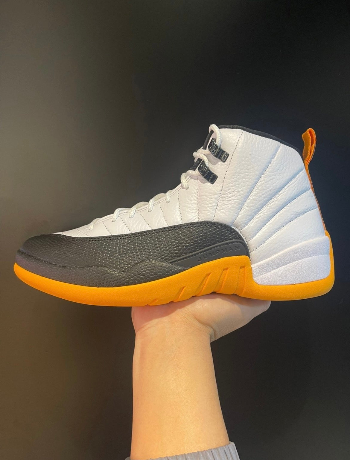 Air Jordan 12 25 Years in China White Black Yellow DR8887-100 - product image from the listing.