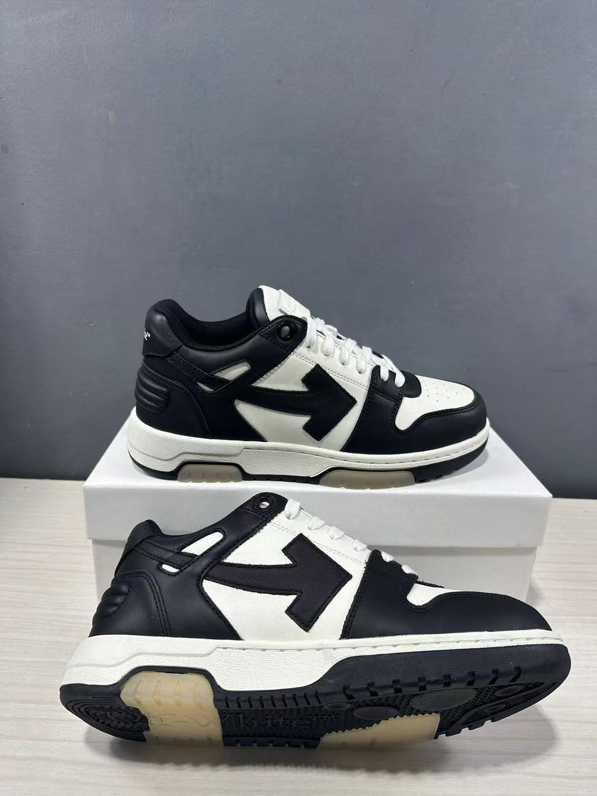 Off-White Out Of Office Low-Top Sneakers in Black White OMAI89C99LEA0070110 - product image from the listing.