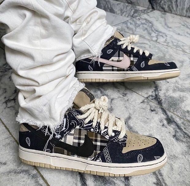Black and Tan Jordan 1 High Paisley Pattern Sneakers - product image from the listing.
