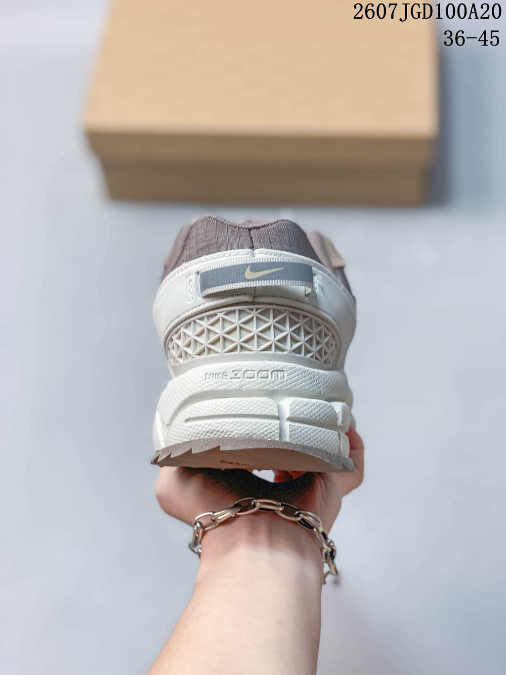 Nike Zoom Vomero Roam Sneakers in Taupe Gray 2607JGD100A20 - product image from the listing.
