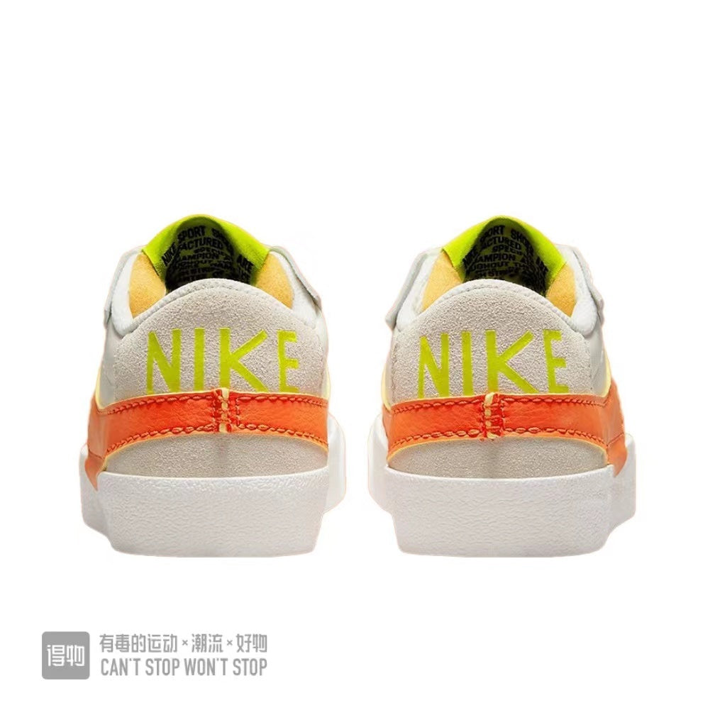 Nike Blazer Low 77 Sneakers in White Orange Volt - product image from the listing.