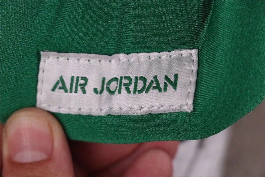 Pine Green Sneakers White/Green - Nike Air Jordan 4 CT8527-113 - product image from the listing.