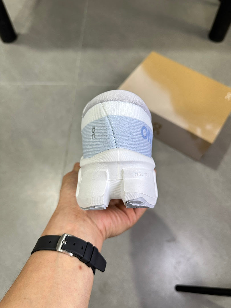 On Running Cloudsurfer Next Running Shoes in White Blue - product image from the listing.