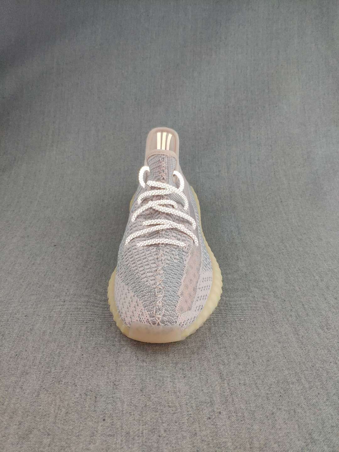 Gray and Cream Yeezy 350 V2 Knit Sneakers - product image from the listing.