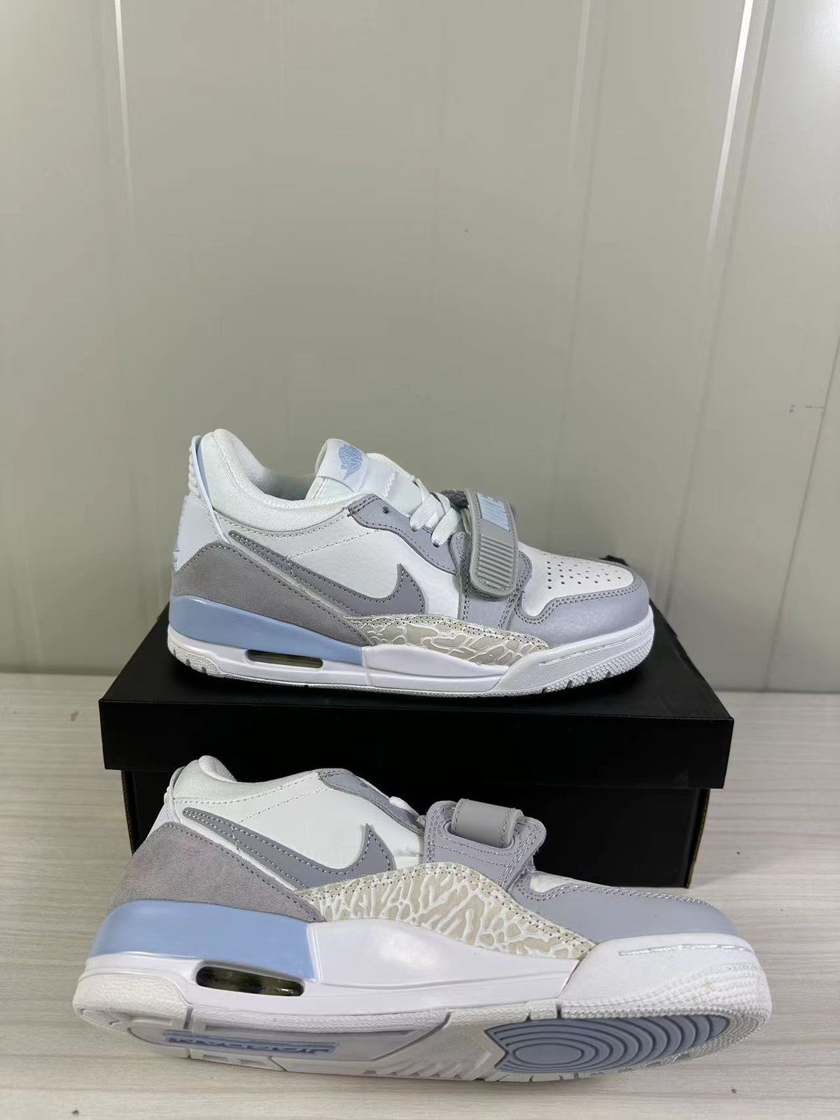 Jordan Legacy 312 Low Sneakers in Glacier Blue HQ1190-101 - product image from the listing.