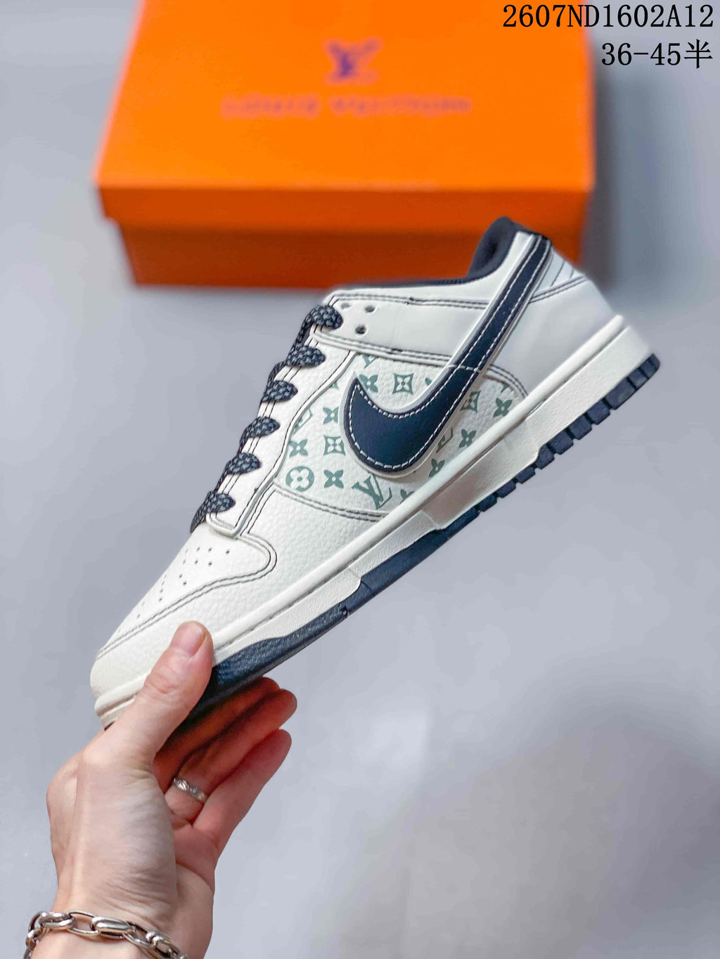 Nike SB Dunk Low Trainers White Black Red Style 2607ND1602A12 - product image from the listing.