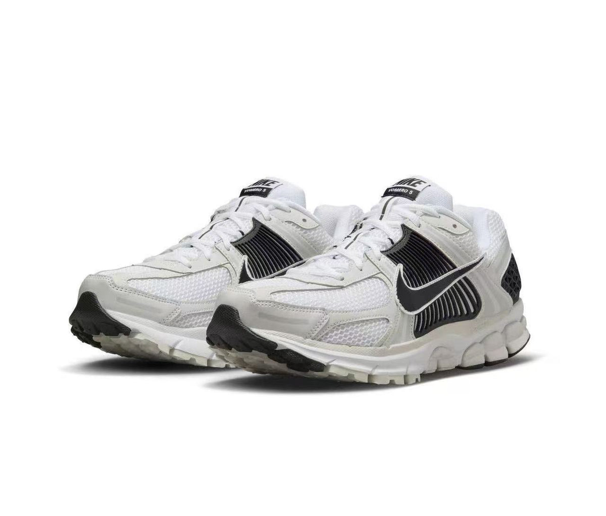 Nike Zoom Vomero 5 Sneakers in White and Black - product image from the listing.