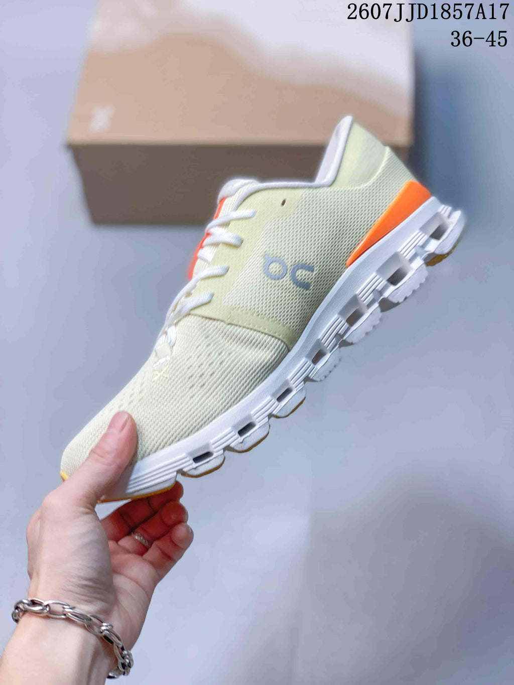 On Cloud X 4 Low-Top Sneakers in Cream Orange - product image from the listing.