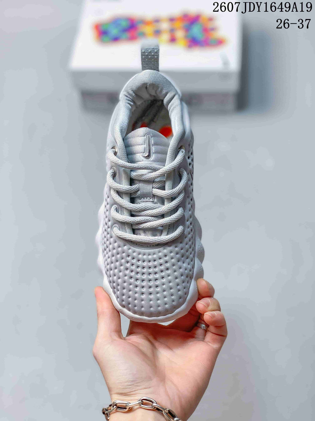 Nike Mind 002 Kids' Sneakers in White and Grey - product image from the listing.
