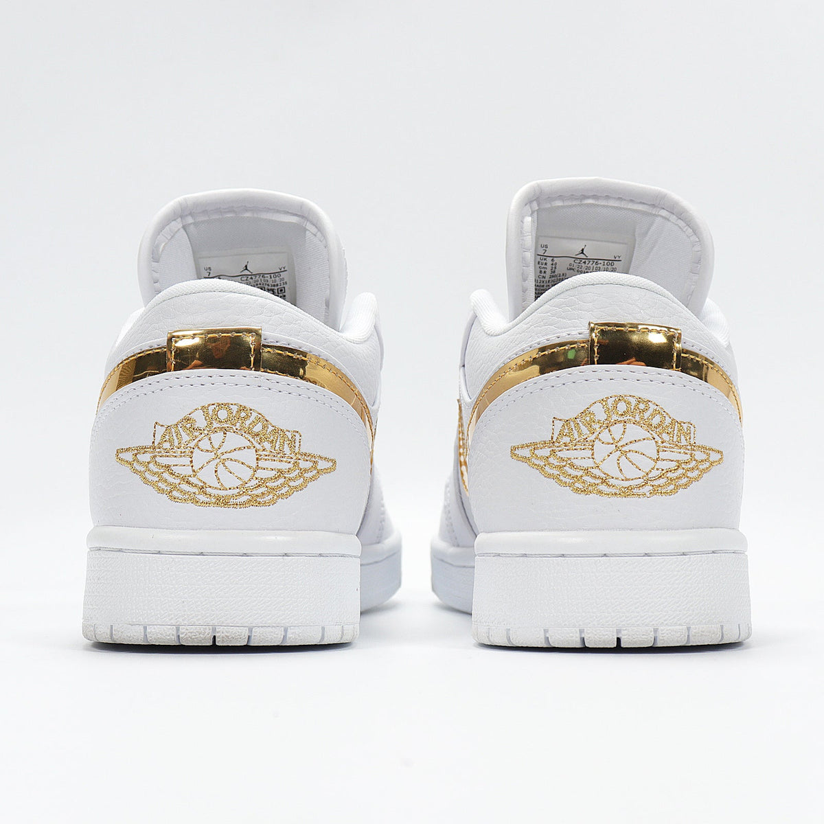 Nike Air Force 1 Low in White Metallic Gold CZ4776-100 - product image from the listing.