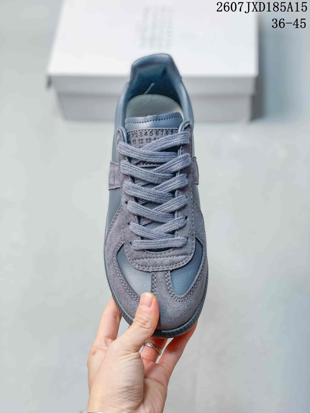 Maison Margiela S57WS0236 Low-Top Sneakers in Gray - product image from the listing.