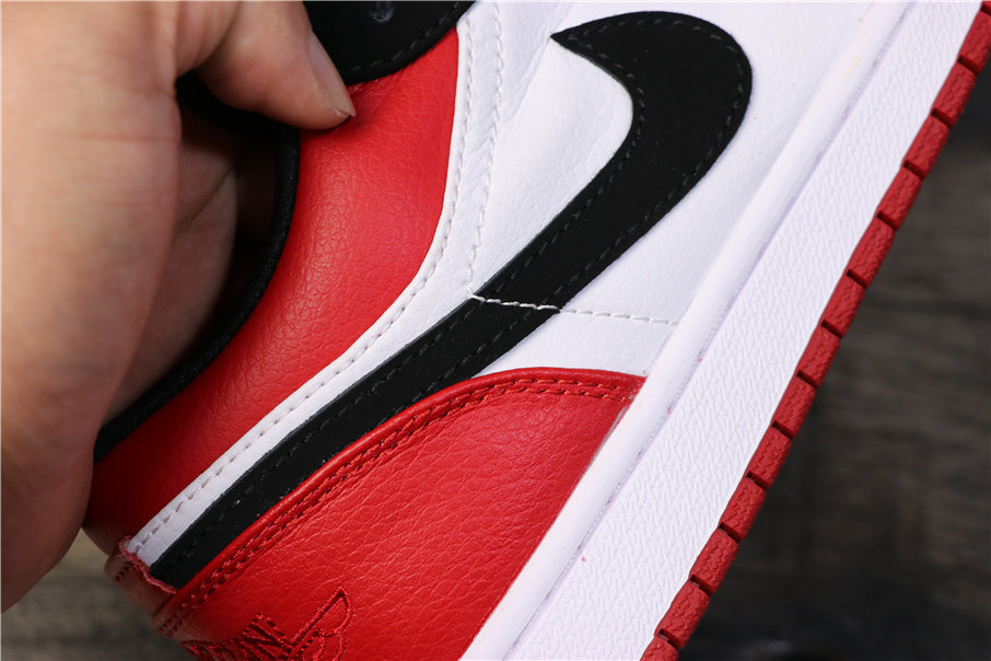 Air Jordan 1 Low Black Toe Sneakers 553558-116 - product image from the listing.
