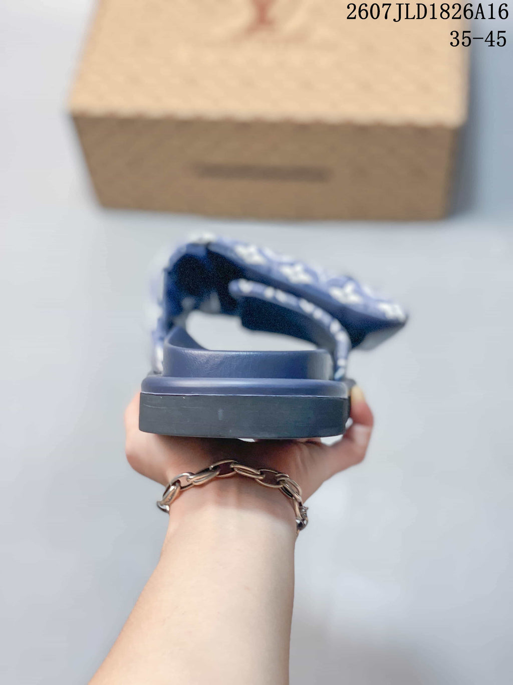 Louis Vuitton Pool Pillow Monogram Slide Sandals in Navy - product image from the listing.