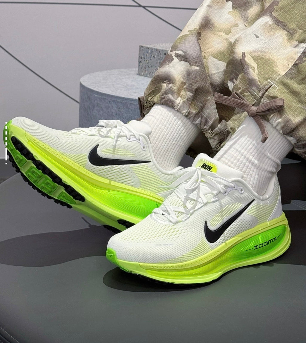 Nike Vomero 18 Running Shoes in White Green HM6803-100 - product image from the listing.