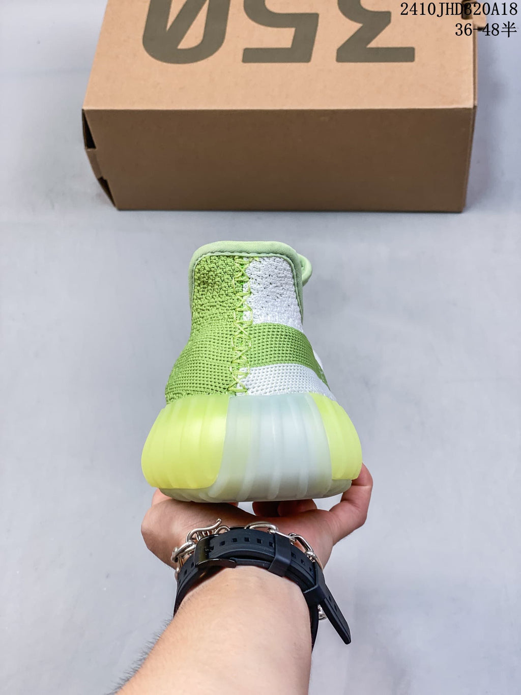 Adidas Yeezy Boost 350 V2 Sneakers in Green White - product image from the listing.
