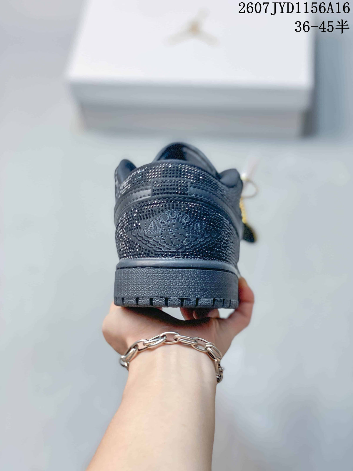 Air Jordan 1 Black Embellished Low-Top Sneakers - product image from the listing.