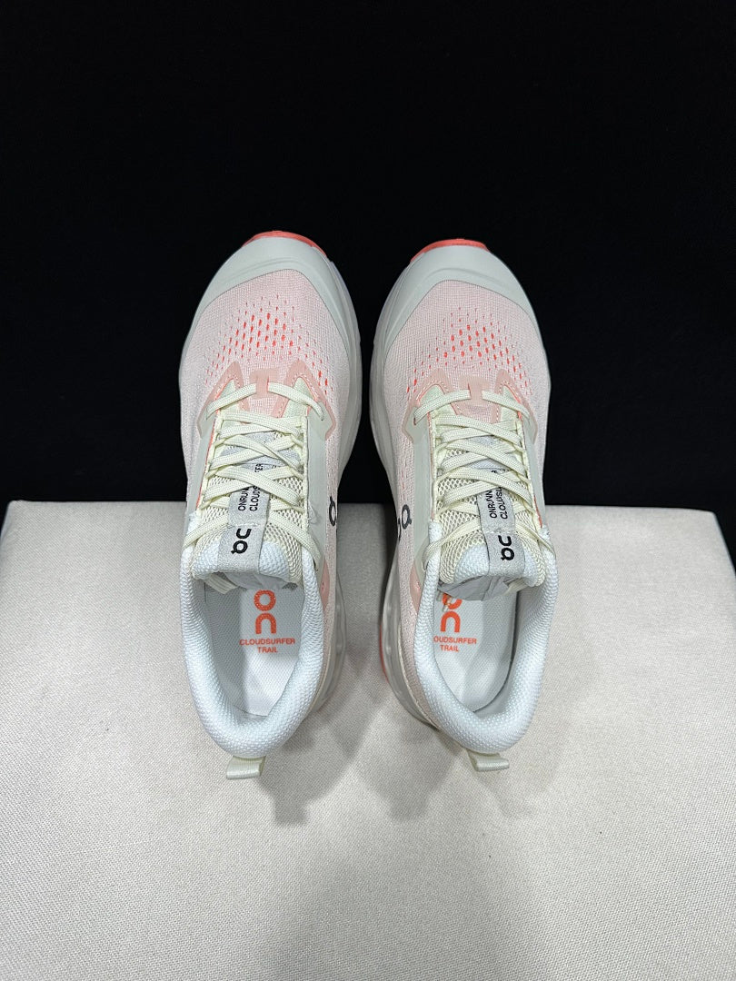 On Cloudsurfer Trail 2 Trail Running Shoes, in Ivory and Coral - product image from the listing.