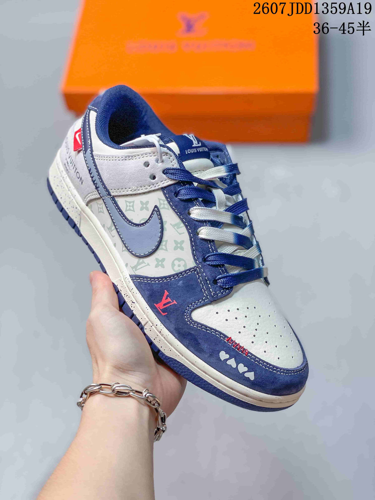 Air Jordan 1 Low Sneakers White and Navy - product image from the listing.