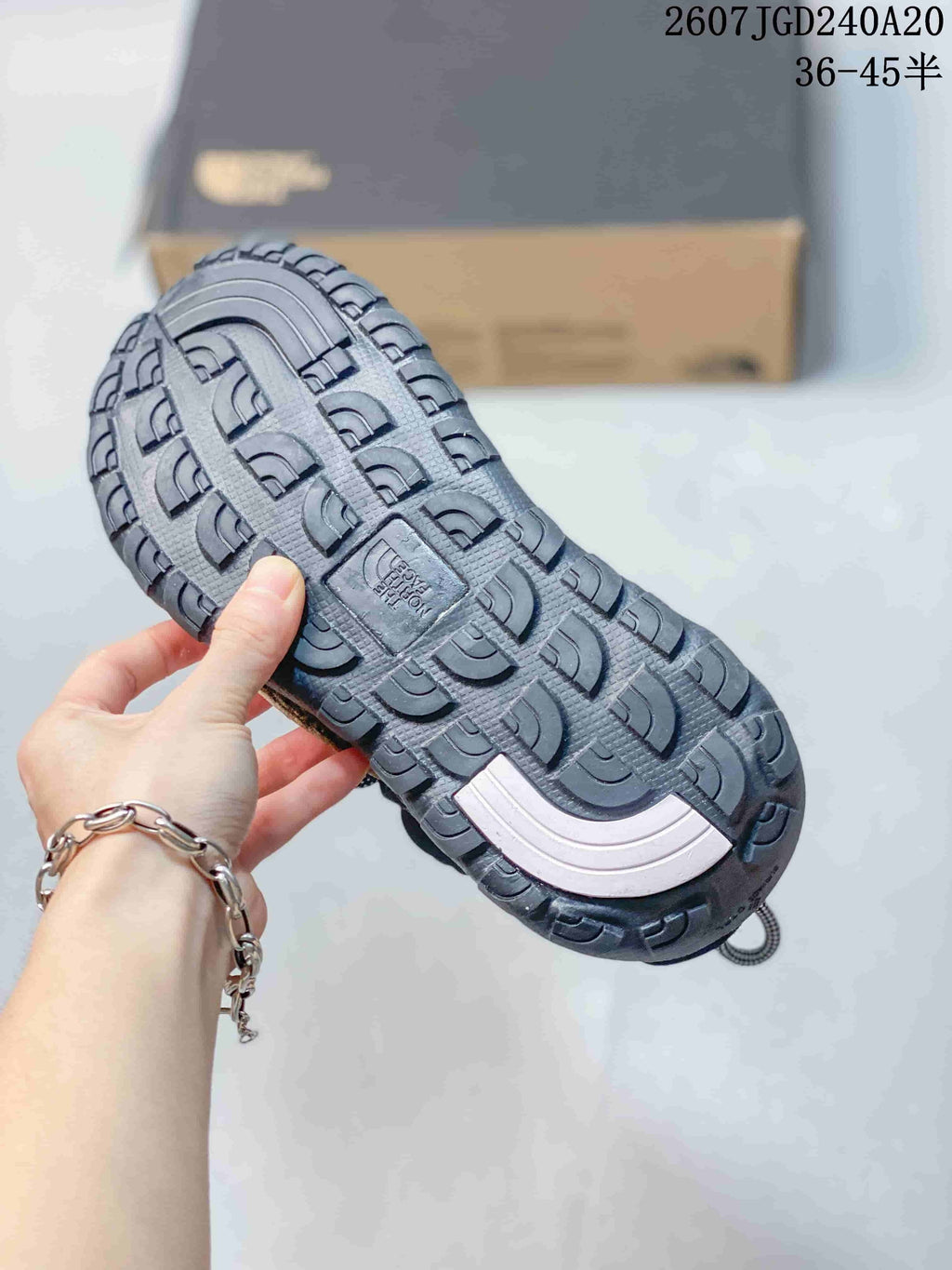 The North Face Explore Camp Sandals in Black and Tan JGD240A20 - product image from the listing.