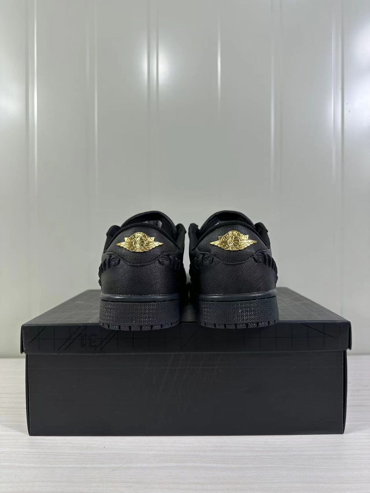 Air Jordan 1 Low Sneakers Black/Gold FN5032-007 - product image from the listing.